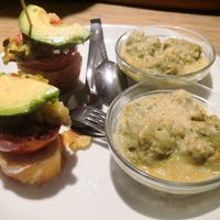 1. Tomate, vinagreta y aguacate; 2. Albóndiga de espinaca con crema de guisantes at Baztan Pintxos & Bar in San Sebastian