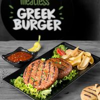 Portion of mega meatless burger at Kokos Pitta in Patras