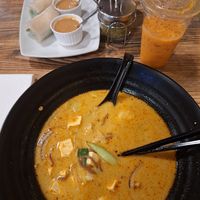 Sen street curry with buckwheat noodles, veggies, tofu and chili sauce and Thai ice tea with non dairy creamer. at Sen Noodle House in Santa Clarita