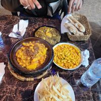 Vegetable tajine, eggplant salad (with olives and lemon), white beans, French fries (don't order them, they're raw)  at Chez Omar in Essaouira