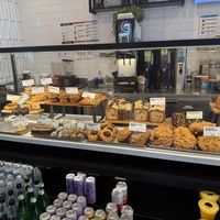 Pastry counter (green outlined signs are vegan)  at Gregorys Coffee in Washington
