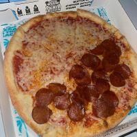 half cheese half (veg) pepperoni  at Playa Pizza in Windermere