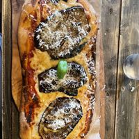 Parmigiana pinsa  at Ortica Italian Plant Based in Urmston