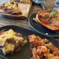 Pinsa and aubergine parmigiana   at Ortica Italian Plant Based in Urmston