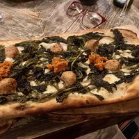 Vegan sausage and wild broccoli pizza  at Ortica Italian Plant Based in Urmston