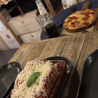 Lasagne and focaccia   at Ortica Italian Plant Based in Urmston