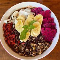 Smoothies bowl with chocolate liquid🍫  at Mother Earth Ubud by Rini in Ubud