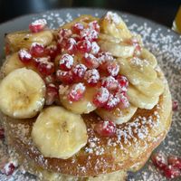 Pancakes with banana and berries (Vegan) at Mundi Café in Charneca Da Caparica
