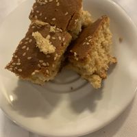 Vegan cake (orange) they gave us this for free to try as they want to do more vegan options and wanted our opinion. They were really friendly and excited about the new vegan ideas  at Castellan Restaurant in Rhodes