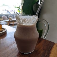 Cacao, banana, peanut butter milkshake at Pure Vegan Heaven - Thong Sala in Koh Phangan