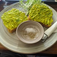 Smashed avocado on sourdough bread at The Little Red Fox Espresso in Siem Reap
