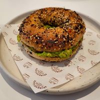 Smashed Avacado, Lemon & Chilli on Everything Bagel. at Reubens Cafe & Coffee in Holyhead