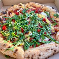 Vegetable pizza with vegan cheese, finished with rocket salad and balsamic vinegar at Oak & Grain - Maybe closed in Ullapool