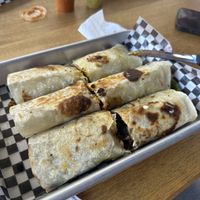 Burritos (los cortamos nosotros a la mitad)  at VegMex in La Paz