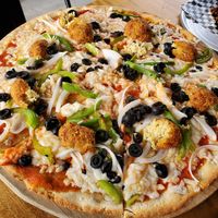 GF pizza with Falafel - delicious!!!!!!! at VegMex in La Paz