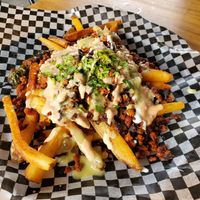 Loaded fries - Holy Moly were they good!!!! Best fries ever! at VegMex in La Paz