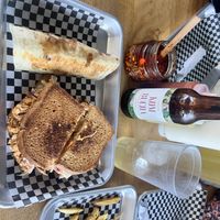 Sandwich con burrito, acompañado con papas   at VegMex in La Paz