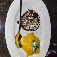 Warmes Schokoküchlein mit Maracuja-Sorbet. Köstlich! at L'Osteria in Bielefeld