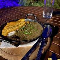 Cacerola EBRO de lentejas y arroz mit grünen Bananen  at Felsengartl Tapas-Heurigen in Emmersdorf An Der Donau