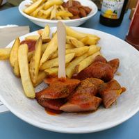 Curry Wurst + Fries at Eh Wurst Vegane Würstelbar in Vienna