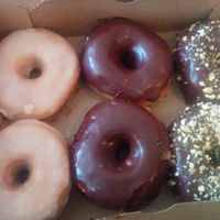 Our delicious takeout order. Last of the day 's selections. at Dun-Well Doughnuts in Brooklyn