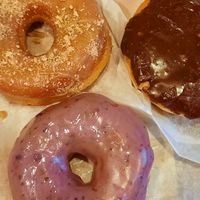 Maple French toast, blueberry, and Boston cream at Dun-Well Doughnuts in Brooklyn