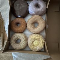 Boston cream, blueberry, apple, cinnamon sugar, pistachio, and lemon custard 😋   at Dun-Well Doughnuts in Brooklyn