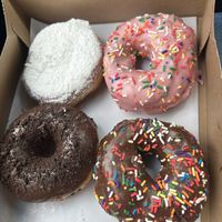 Raspberry jelly, strawberry, chocolate, and triple chocolate  at Dun-Well Doughnuts in Brooklyn