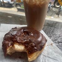 Boston cream pie and ice chai.  at Dun-Well Doughnuts in Brooklyn