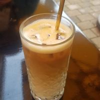 Iced latte macchiato with oat milk at Lieblingsplatz am Tegernsee in Gmund Am Tegernsee