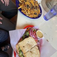 Chili cheeze fries and the tofu avocado sandwich. Delicious !  at Rosetta's Kitchen in Asheville