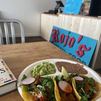 One of each taco with a side of beans and avocado. So good!  at Rojos Mexican Food in Seattle