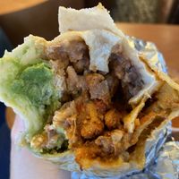 Cremosa burrito with al pastor   at Rojos Mexican Food in Seattle
