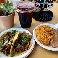 1 carne asada, 1 carnitas taco, rice & beans, agua de jamaica   at Rojos Mexican Food in Seattle