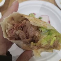 Carnitas loaded burrito absolute perfection at Rojos Mexican Food in Seattle