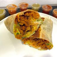 loaded burrito w/al pastor, pedro style (plated at home) at Rojos Mexican Food in Seattle