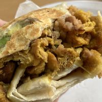 Cremosa burrito with chick'n  at Rojos Mexican Food in Seattle