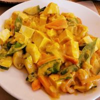 Creamy curry stir fry with coconut milk and crispy tofu. at The Orchard in Frederick