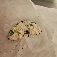 Pumpernickle onion sesame bagel with tofutti scallion cream cheese at Great Barrington Bagel Co in Great Barrington