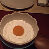 it's an egg but not an egg! sweet mango, frozen passion fruit, and whipped coconut come together in a refreshing, light dessert at Cuca in Jimbaran