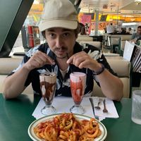 Milkshakes and curly fries   at Mel's Drive-In in West Hollywood