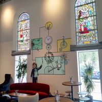 They kept the original features of the church and added a cool steampunk design throughout the building at Batteliek in Mechelen