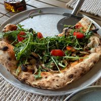 Greta with delicious vegan cheese and one of the best crusts I've ever had.  at GRAVA in Pals