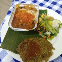 Quinoa pasta with tomato sauce, salad, lentil patty at Vida y Salud in Cali