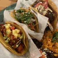 Al pastor, barbacoa and plantain with mole tacos as a platter  at Tacotarian in San Diego