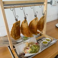 Birria Empanadas - fantastic! Also 2 tacos. Perfect for 2 people. Watch for this special again. Was available in July and August in 2024. at Tacotarian in San Diego