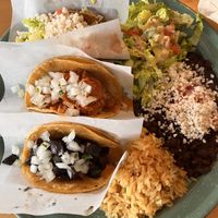 Taco platter-top rice & beans, middle Barbacoa, bottom mushroom asada  at Tacotarian in San Diego