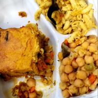 Plantain lasagna chickpea stew over brown rice and mac and cheese at Sweet and Natural in Mount Rainier