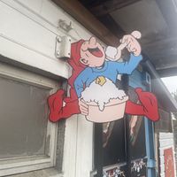 That is the happy face you do when you eat it!   at Baobab - Food Stand in Copenhagen