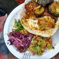 Moussaka with salad at Willow Vegetarian Garden Restaurant in Totnes